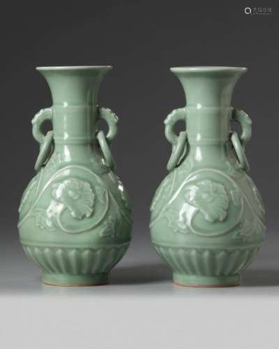 A pair of celadon glazed vases