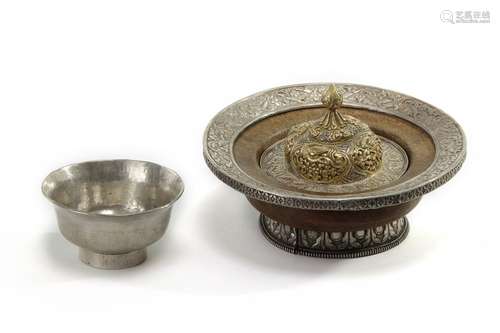 A Mongolian second grade silver tea bowl and parce…