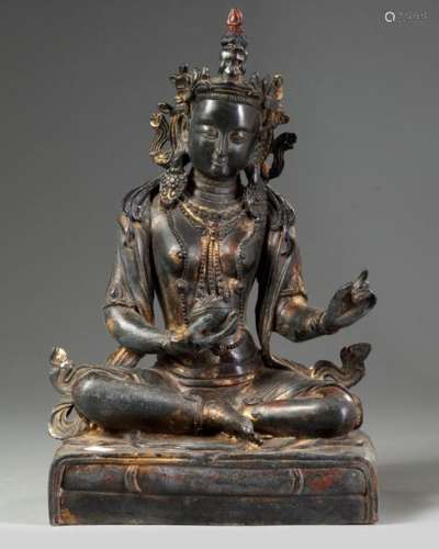 A Chinese bronze figure of Guanyin