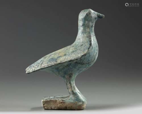 An Islamic turquoise glazed figure of a bird