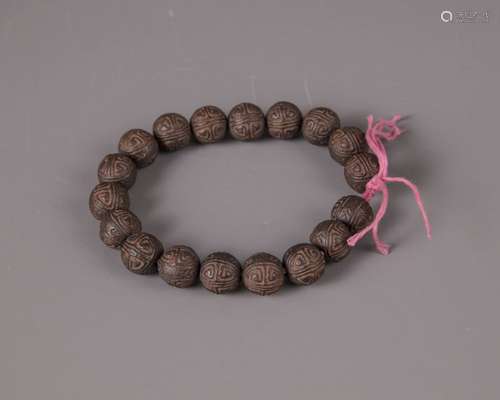 A Chinese aromatic wood bracelet