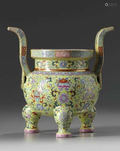 A Chinese yellow ground famille rose tripod censer