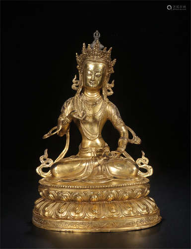 CHINESE GILT BRONZE SEATED GUANYIN ON LOTUS BASE