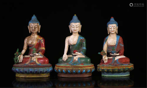 THREE CHINESE COLOR PAINTED BRONZE SEATED BUDDHA