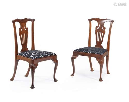 A set of twelve mahogany dining chairs, in George …