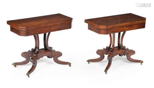 A pair of Regency mahogany and rosewood crossbande…