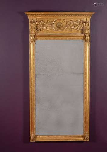 A carved giltwood and composition wall mirror, cir…