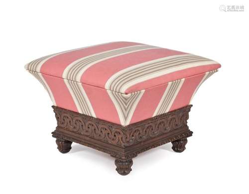 A George IV carved oak and upholstered ottoman foo…