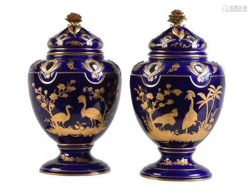 A pair of English porcelain blue ground and gilt p…