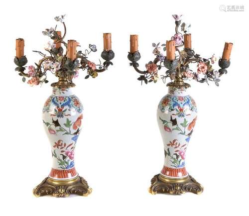 A pair of French famille rose gilt metal mounted f…