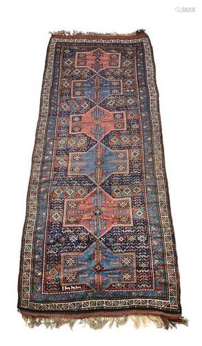 A Kazak gallery carpet, the navy and madder centra…