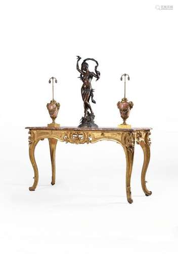 A pair of Regence carved giltwood side tables, cir…