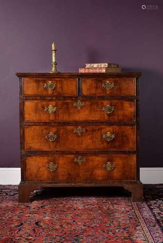 A George II walnut chest of drawers, circa 1735, f…