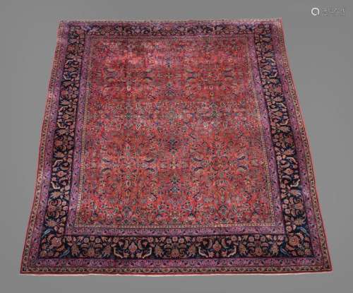 A Kashan carpet, the madder field decorated overal…