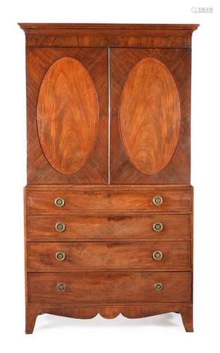 A Regency mahogany and inlaid linen press, circa 1…