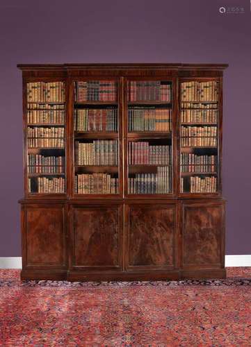 A George III mahogany breakfront library bookcase,…