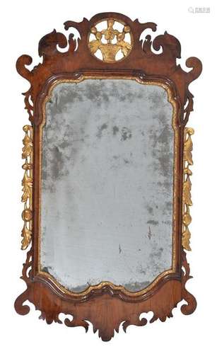 A George II walnut and parcel gilt wall mirror, ci…