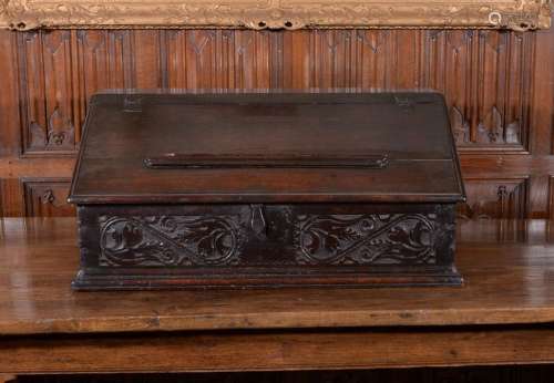 A Charles II oak desk box, circa 1660, the hinged …