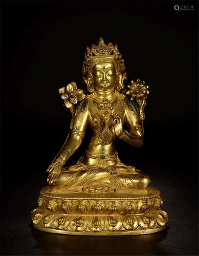 TIBETAN GILT BRONZE SEATED TARA WITH LOTUS