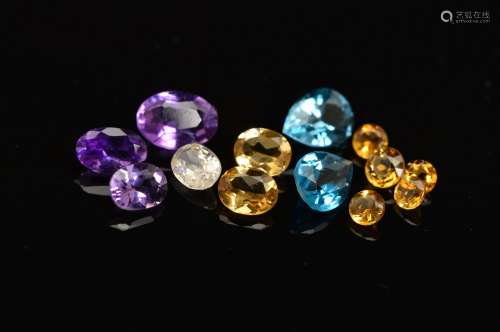 A LARGE SELECTION OF VARIOUS GEMSTONES, to include three packets of amethyst of various shapes and