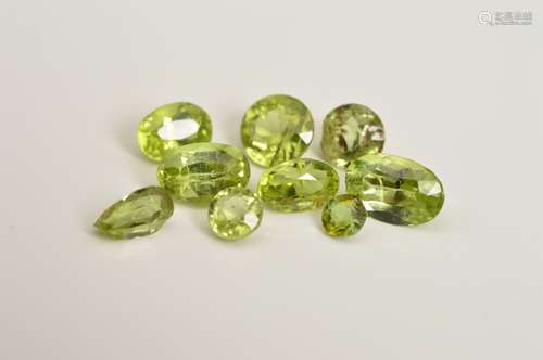 A SELECTION OF PERIDOT GEMSTONES, ranging between 0.10ct - 0.75ct, mix of cuts including oval, round