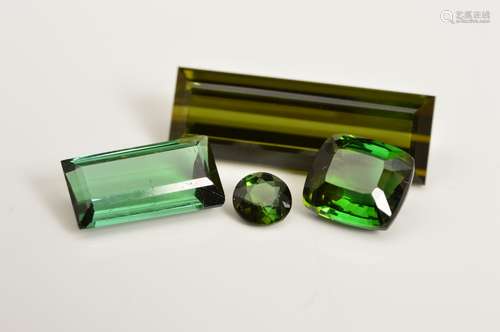 A LARGE COLLECTION OF GREEN TOURMALINES, ranging in shapes and sizes, ranging from 0.26ct - 6.