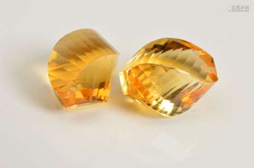 CITRINE TWISTED DROPS, to include two twisted drop citrine beads, measuring approximately 13mm x