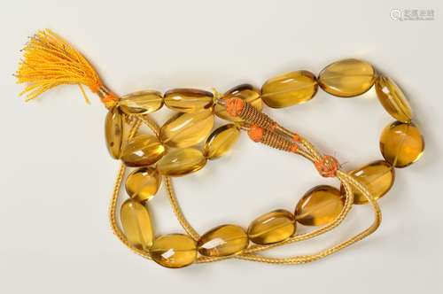 'BEER QUARTZ' OVAL BEAD NECKLACE, comprising approximately 19 beads, graduating in size between