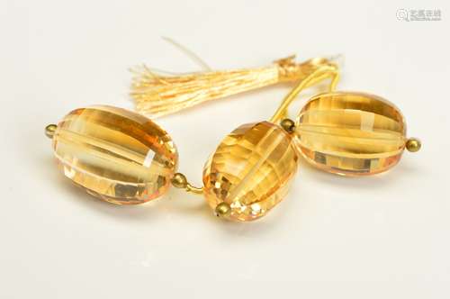 THREE CITRINE EGG BEADS, measuring approximately 19mm, approximate combined weight 59.85ct