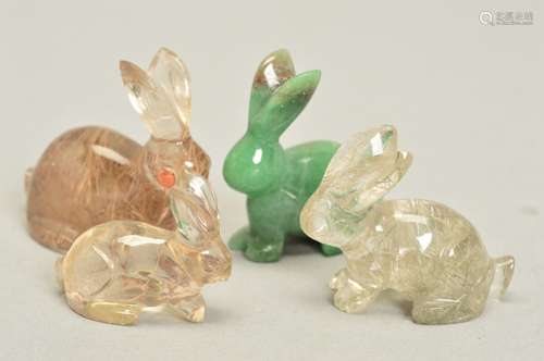 A SELECTION OF FOUR CARVED QUARTZ RABBIT ORNAMENTS, to include rutile quartz and aventurine