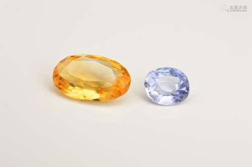 TWO SAPPHIRES, to include one yellow oval mix cut, measuring approximately 20.2mm x 8.1mm,