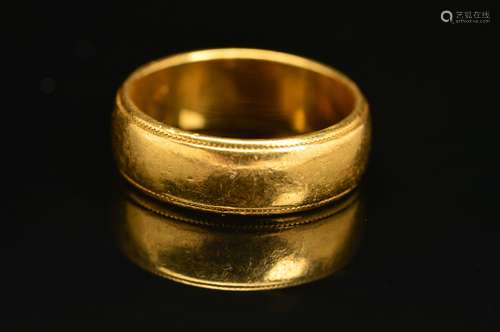 A LATE 20TH CENTURY 22CT GOLD WEDDING BAND, plain polished with a bead edge, measuring approximately