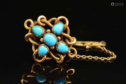 A LATE VICTORIAN GOLD TURQUOISE BROOCH, four turquoise stones oval and pear shape cabochons,