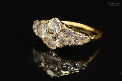 AN EARLY 20TH CENTURY DIAMOND DRESS RING, comprised six old Swiss cut diamonds measuring from 4.