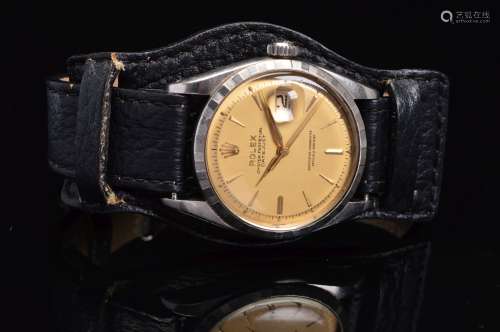 A GENTS ROLEX OYSTER PERPETUAL DATEJUST STAINLESS STEEL WRISTWATCH, model 6605, circa 1959, serial