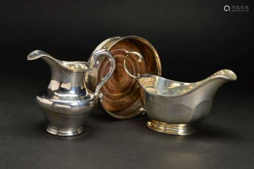 A VICTORIAN SILVER CREAM JUG, of baluster form, 'S' scroll handle, stepped circular foot, makers
