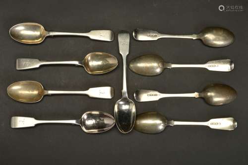 A SET OF NINE VICTORIAN IRISH SILVER FIDDLE PATTERN TEASPOONS, engraved with a griffin head crest,
