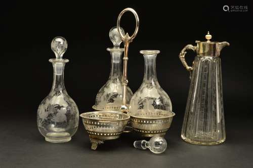 A LATE VICTORIAN SILVER PLATED THREE DIVISION DECANTER, the central handle surrounded by three
