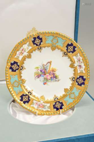 A STEFAN NOWACKI PORCELAIN CABINET PLATE, of silver shape with gadrooned rim, raised gilding to