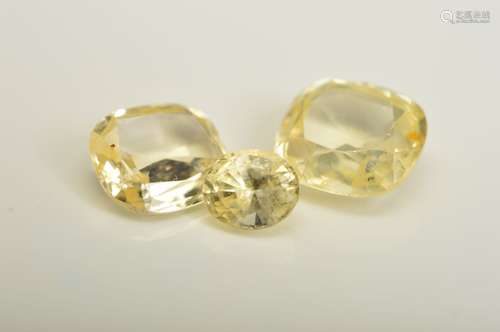 THREE YELLOW SAPPHIRES, to include two cushion mix cut, weighing 1.15ct- 1.85ct, also one oval mix