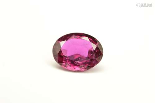 A MIX CUT OVAL RUBY, measuring approximately 7.9mm x 6.5mm, weighing 1.59ct, surface reaching