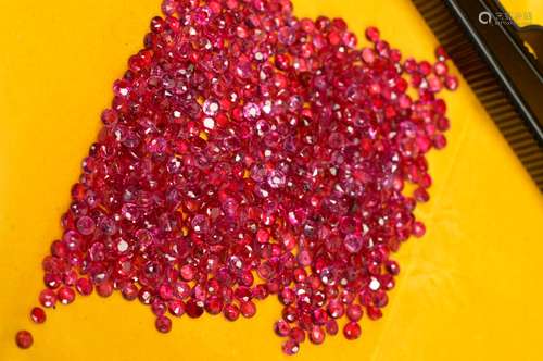 A SELECTION OF SMALL ROUND RUBIES, measuring approximately 2mm in diameter, approximate combined