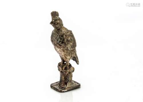 A George V silver model of a bird, import marks for London 1924, by SBL, the crested bird with
