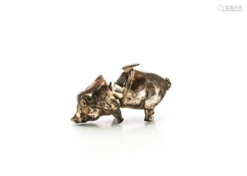 A c1950s silver plated novelty cigar cutter, modelled as a pig, 6.5cm seems in good condition but