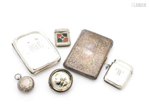 Four Victorian and later collectable items of silver, including a purse, a cigarette case, a vesta