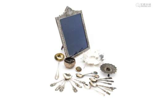 A collection of vintage and modern white metal items, including a Thai silver and niello work