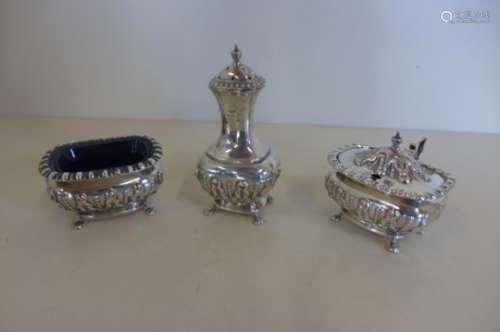 A silver Asprey and Co three piece cruet set including salt, mustard and pepperette, with