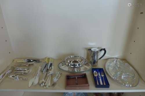 A collection of silver plated items and cutlery set