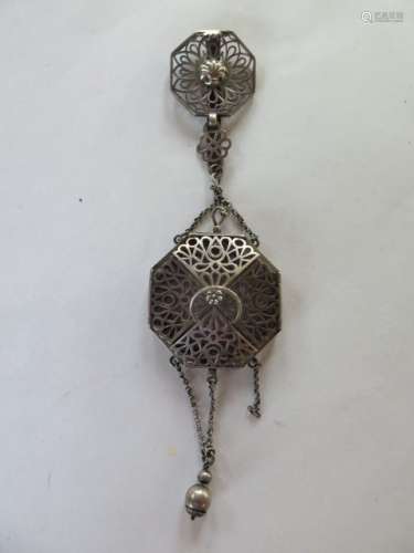 A white metal chatelaine, approx 40 grams, one chain broken and some bending, 18cm long