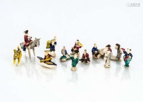 A collection of vintage Chinese miniature pottery figures the very small figures and groups with